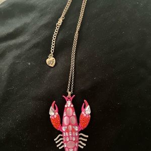 Long chain necklace by Betsy Johnson